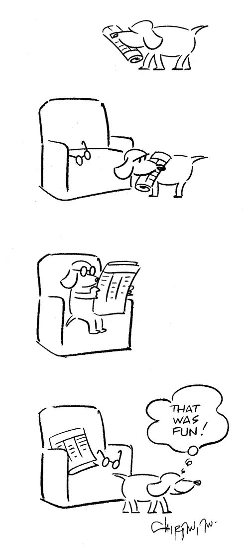 Dog reading the paper.