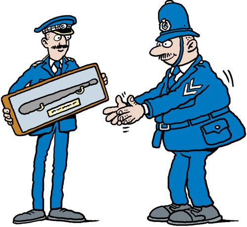 Policeman receiving an award of a truncheon