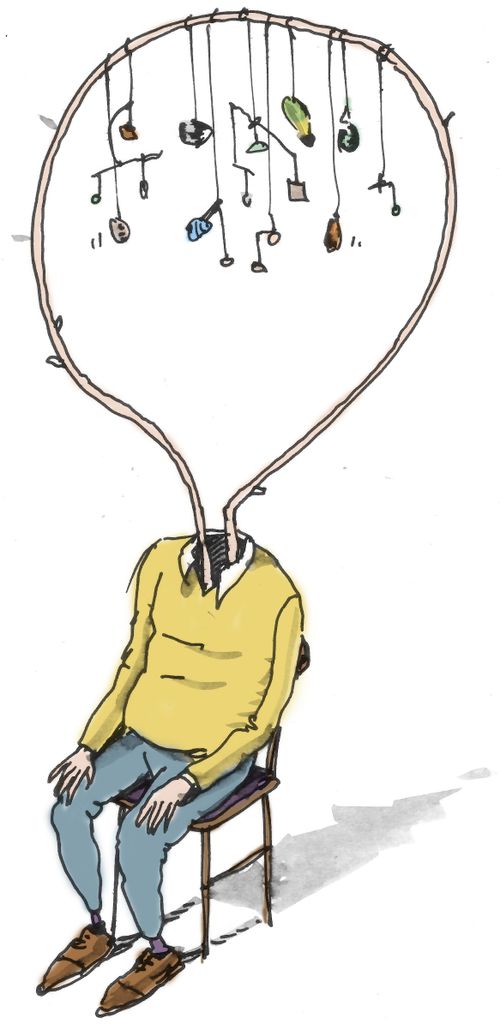 Seated man whose head is an abstract sculpture.