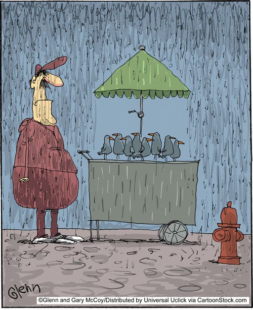 Hot dog vendor in the rain.