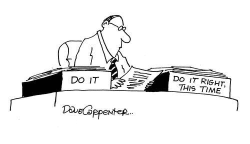 Desk trays - 'Do it' and 'Do it right this time'.