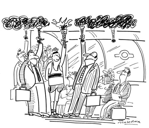 Torch runner on the London underground.