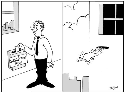 Man putting a piece of paper into a Suggestion Box. The piece of paper is then seen flying out of a hole on the other side of the wall into the air.