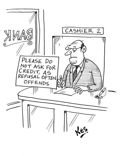 Bank cashier sits near sign: 'Please do not ask for credit, as refusal often offends'.