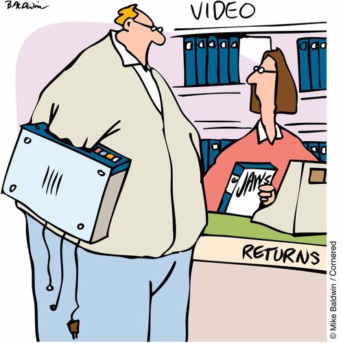Man returning Jaws to the video shop