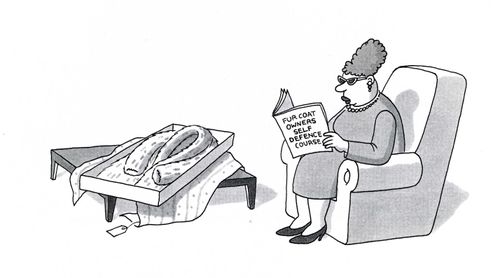 Woman with fur coat reading book, "Fur coat owners self defence course"