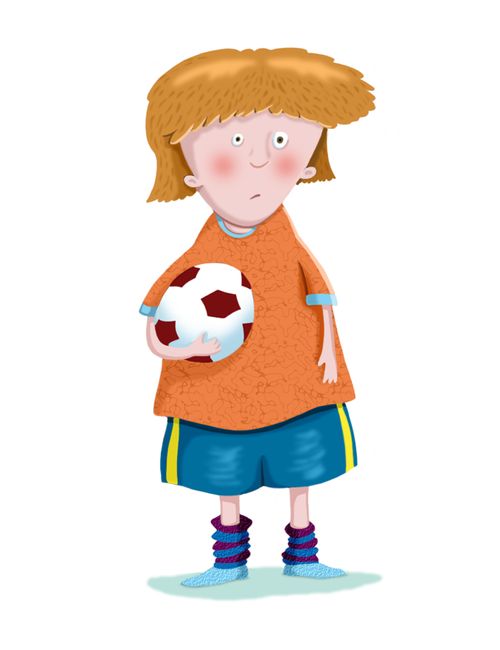 Boy holding football.  
