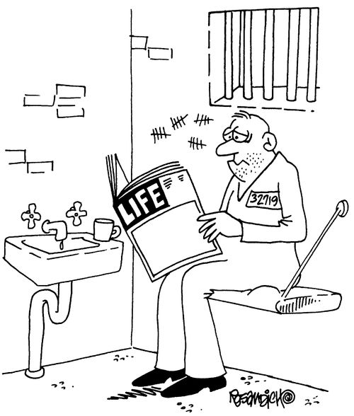 Prisoner reads copy of "LIFE"