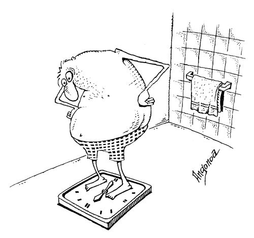 Man standing on weighing scales in his bathroom