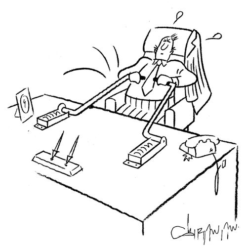 Rowing machine attached to a desk.