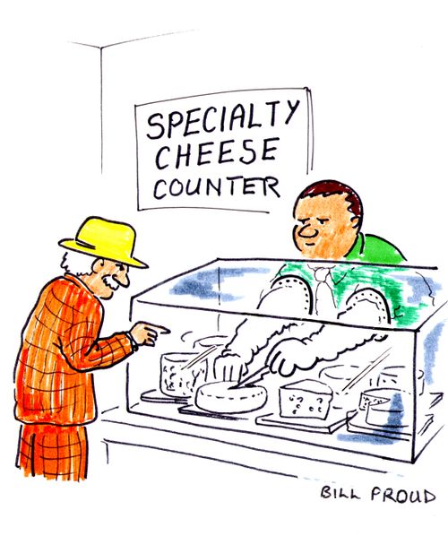 Speciality Cheese Counter - using protective gloves to cut it.