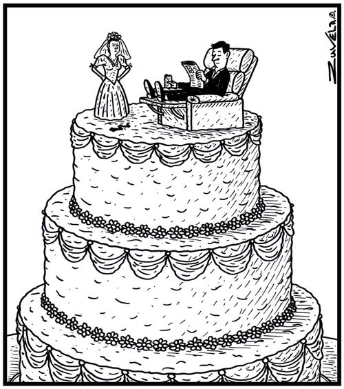 Wedding cake figurines show a lazy husband in a recliner chair.
