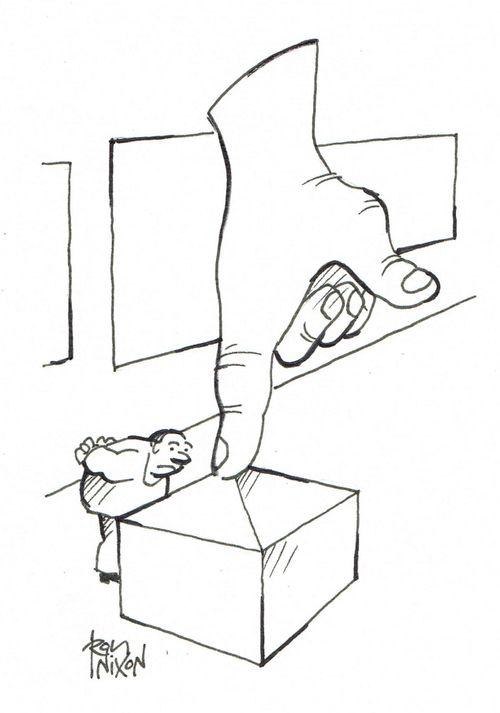Visitor to art gallery staring at pointing finger sculpture.