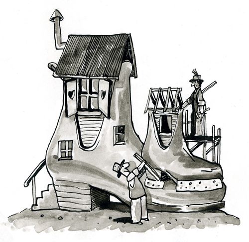 Smaller shoe being built onto a shoe house.