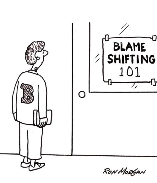 College student looks at sign on classroom door: Blame Shifting 101.