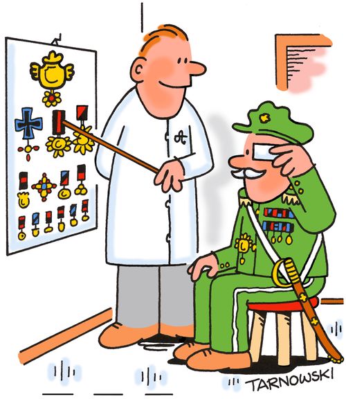 Veteran using medals for an eye test.