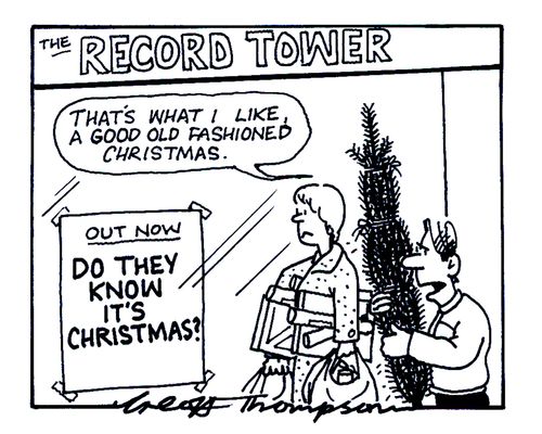 'That's what I like, a good old fashioned Christmas.' (sign in window reads 'Out now - Do They Know It's Christmas!')