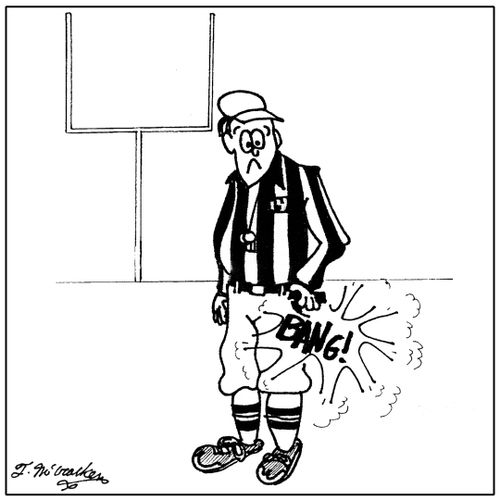 A football referee accidentally shoots his starting pistol in his pocket.
