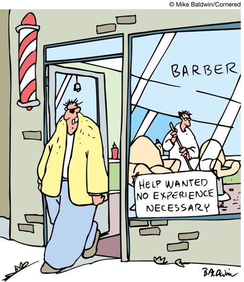 Sign in barbershop window reads: 'Help wanted, no experience necessary'.