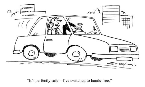"It's perfectly safe ? I've switched to hands-free." (Driver steers with his feet while talking on mobile phone). 