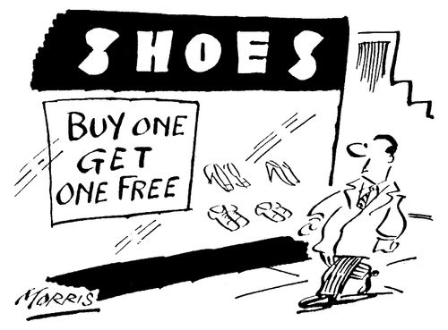 Buy One Get One Free Sign Outside Shoe Shop