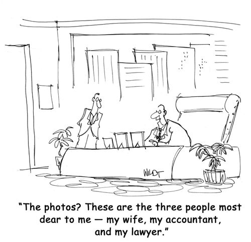 'The photos? These are the three people most dear to me ? my wife, my accountant, and my lawyer.'