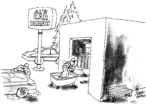 Man going through a car wash in a bath tub.