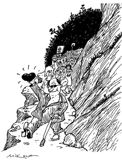 Man leading a procession of followers around a moutainous region waving a heart