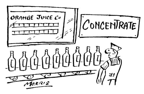 Concentrate Sign Above Orange Juice Factory Line