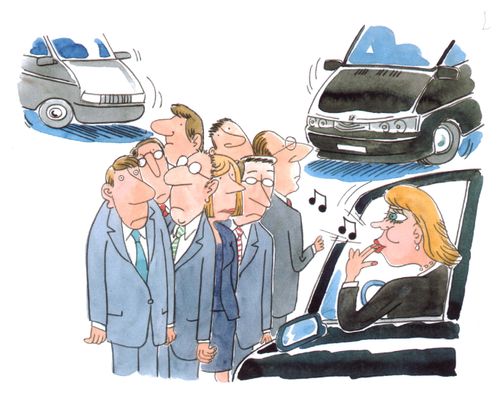 Woman rounding up people in suits.