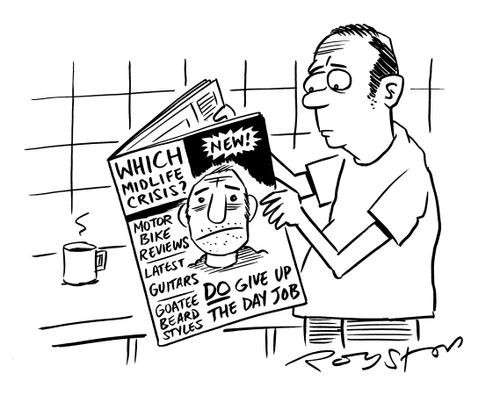 Man reads magazine entitles Which Midlife Crisis?