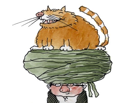 A fat ginger cat sits atop the turban of a man