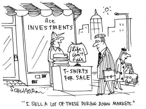 T-shirts for sale: 'life isn't fair'. Vendor comments, 'I sell a lot of these during down markets.'