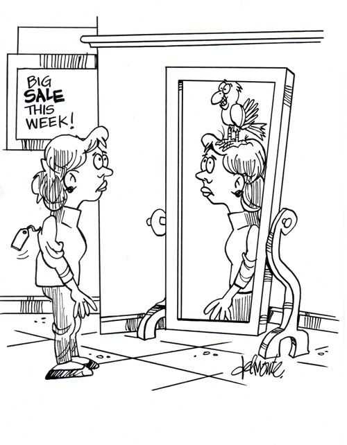 Girl in front of mirror sees bird in reflection.