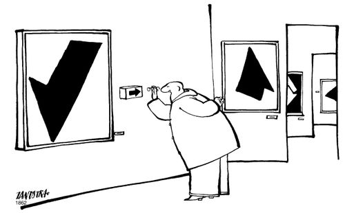 Visitor at an art exhibiton admiring a gallery notice.