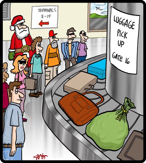 Santa waiting for his luggage at the airport.