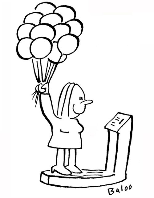 Woman stands on scales, holds bunch of balloons.