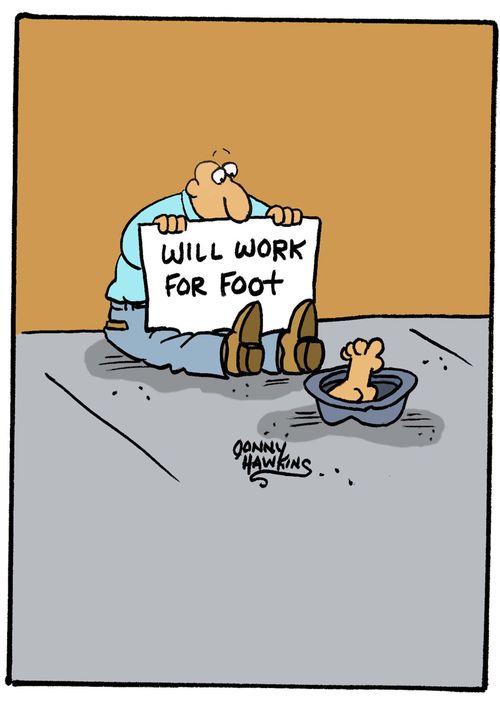 Beggar holding sign 'Will Work for Foot'.