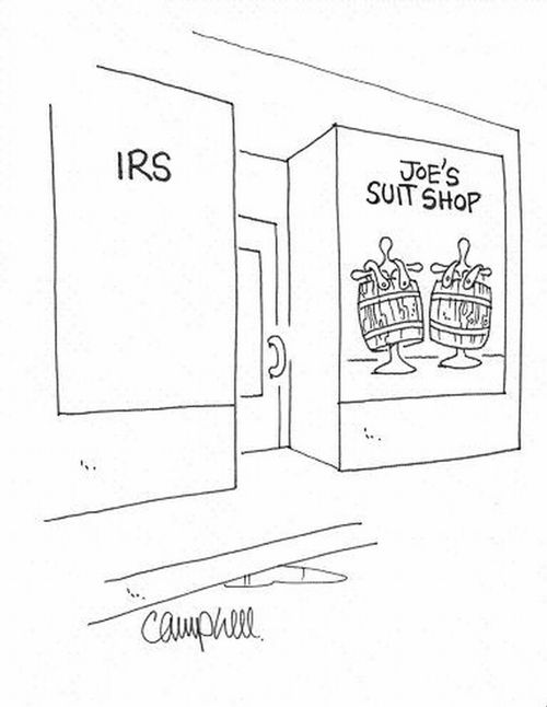 Suit shop next door to IRS shows barrels in window.