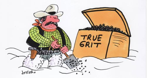 Cowboy spreading true grit on snow