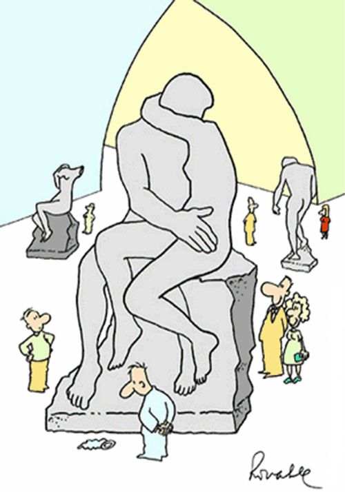 'Man looking at sculpture of Rodin.'