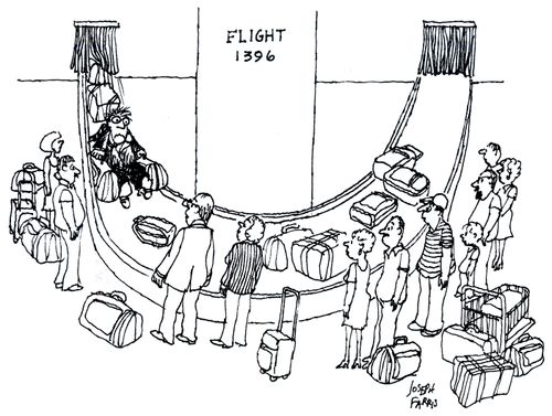 Man comes through luggage collection conveyor belt at the airport.