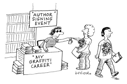 Graffiti artists signs his memoirs in bookshop.