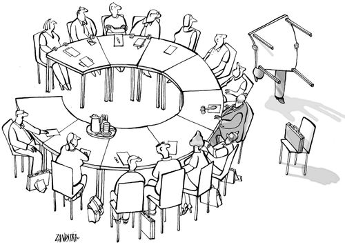 Businessman moving part of a round table.