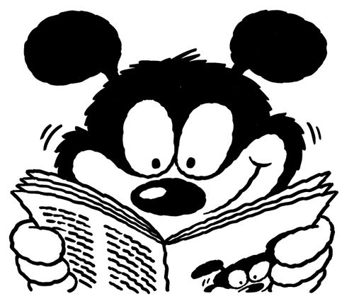 Dog reading a comic about himself.
