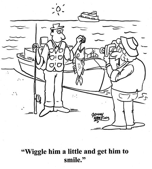 Lady to man taking picture of fish: 'Wiggle him a little and get him to smile.'