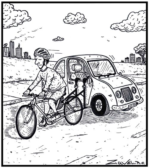 A cyclist carrying his car on his bicycle.