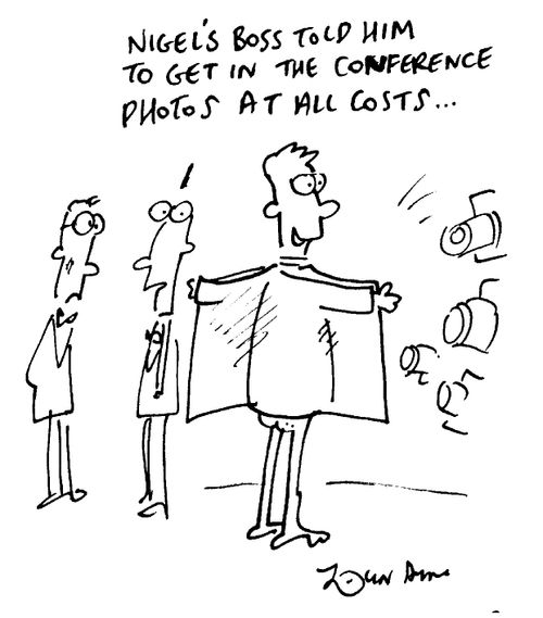 "Nigel's boss told him to get in the conference photos at all costs"