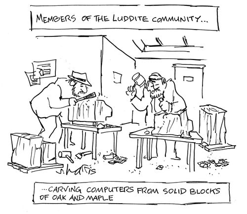 Members of the Luddite community carving computers from solid blocks of oak and maple