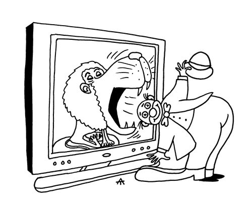 A Clown pretends to put his head in the mouth of a TV lion.